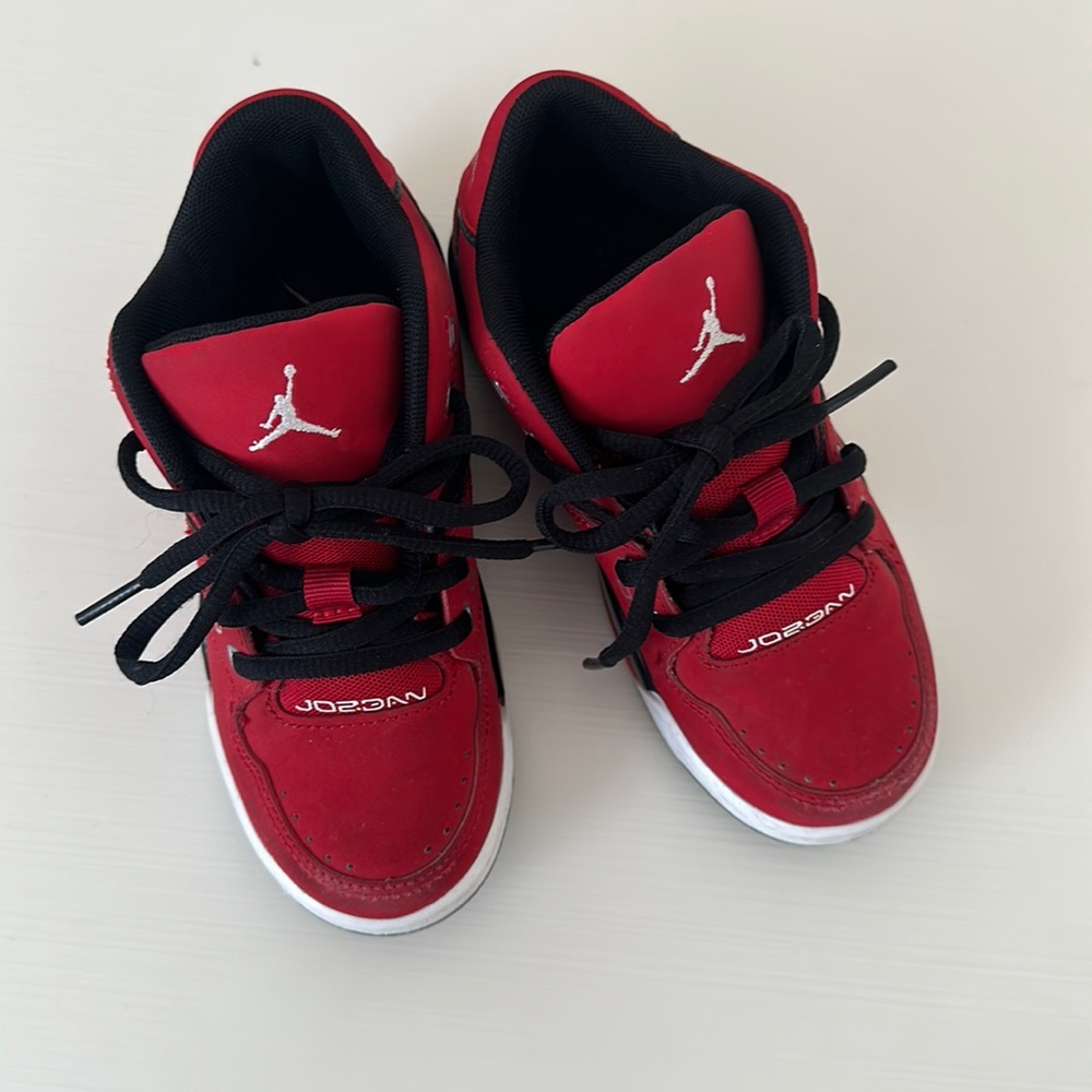Jordan’s red. Boys size 11c